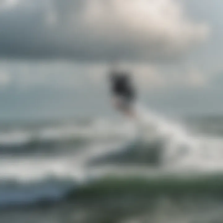 A kiteboarder gliding over the waves in Georgia's coastal waters