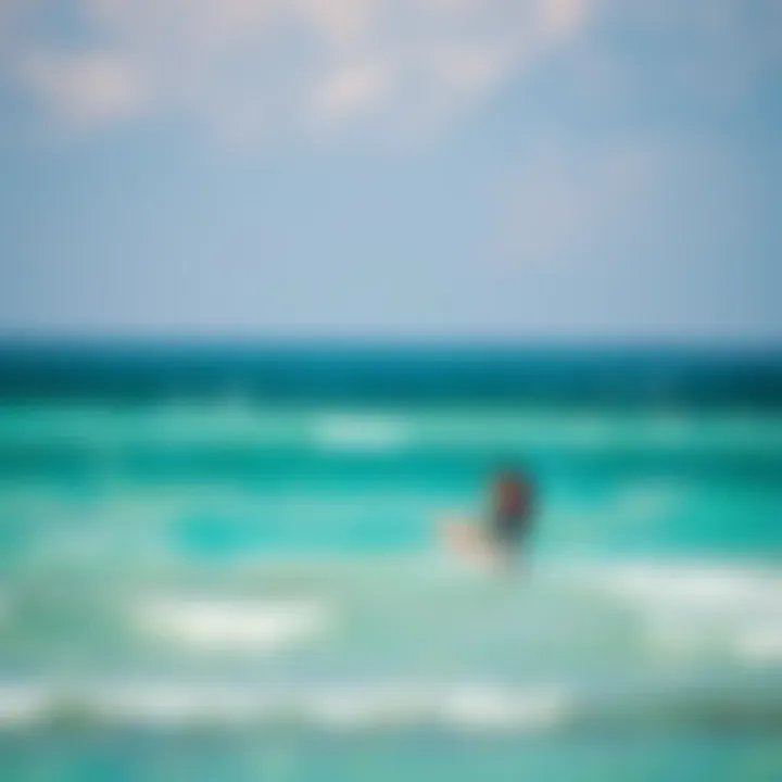 Gliding Over Turquoise Waters Kiteboarder gliding over turquoise waters