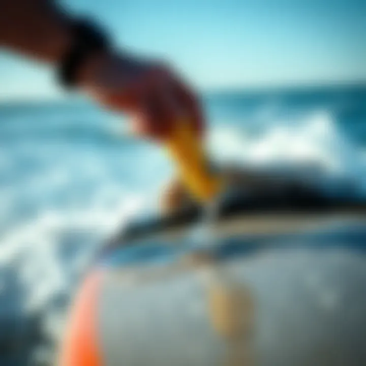 Application process of wax remover on a surfboard