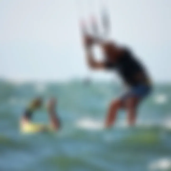 Instructor Demonstrating Backrolling Kiteboarding instructor demonstrating backrolling techniques on the water