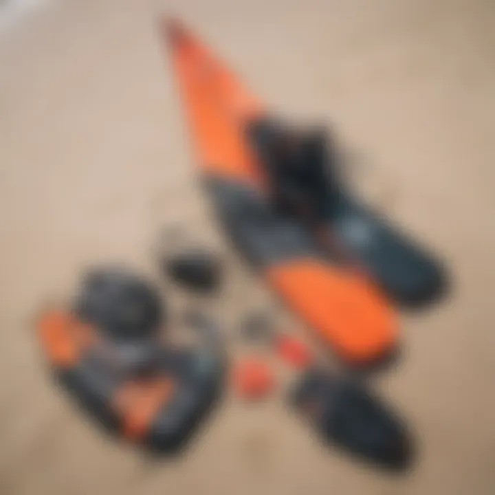 Kiteboarding gear laid out on the beach