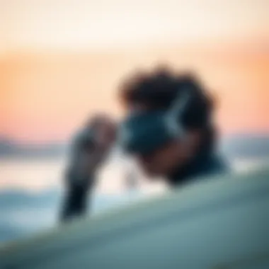 A surfer inspecting their protective gear before hitting the waves