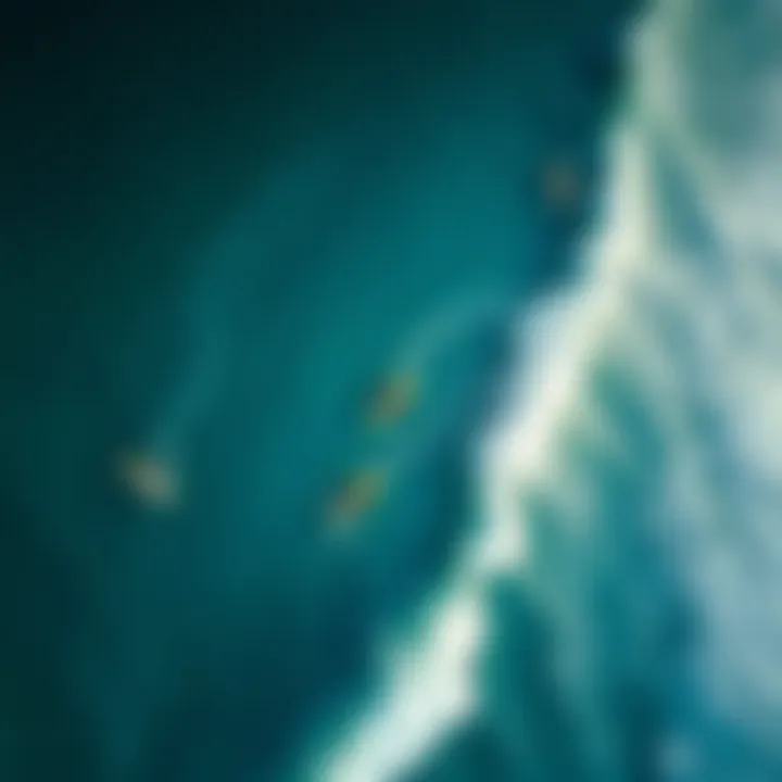 An aerial view of kiteboarders navigating Oahu's waves