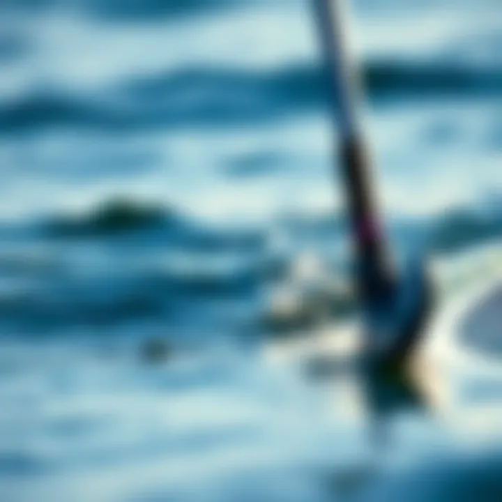 Foil Technology Enhancing Paddle Boarding Close-up of foil technology in action on water