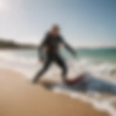 A kitesurfer using a pump at the beach before starting their session.