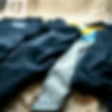 Different wetsuit thicknesses laid out for comparison