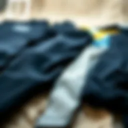 Different wetsuit thicknesses laid out for comparison