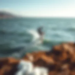 Kiteboarder soaring above the waves at Viana do Castelo