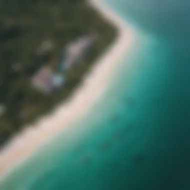 Aerial view of kiteboarders riding the turquoise waters of Watamu